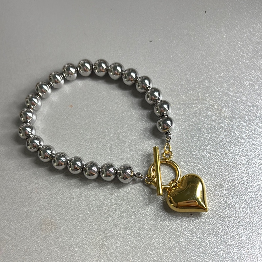 Silver and Gold Heart Charm Bracelet